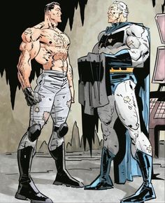 an image of two men in batman costumes standing next to each other and one is talking