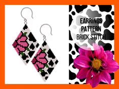 the earrings are decorated with pink flowers and black dots on white, red, and orange background