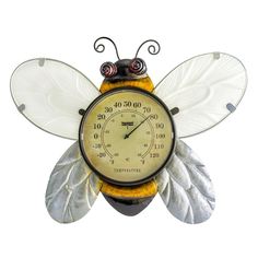 a clock shaped like a bee with wings on it's body and face, sitting in front of a white background