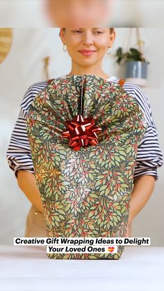 a woman holding a wrapped gift bag with the words creative gift wrapping ideas to delight your loved ones