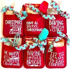 six red bags with christmas sayings on them