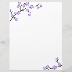 a white paper with purple flowers on it and an empty sheet of paper in the middle