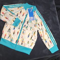 Kids Adidas Track Jacket. New With Tags. No Wear, Tear Or Stains. Colors Are White With Teal Trim. Casual Long Sleeve Outerwear For Play, Playful White Long Sleeve Outerwear, Multicolor Spring Outerwear For Playtime, Multicolor Spring Playtime Outerwear, White Winter Outerwear For Playwear, Teal Trim, Adidas Track Jacket, Adidas Jackets, Adidas Track