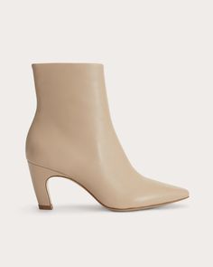 A boot that’s ahead of the curve. It’s the ankle boot like you’ve never seen it before. Swooping lines give this style an artistic sense of sophistication. Crafted from soft Nappa leather with a soft pointed toe and secret side zips for easy on-off, it’s the ideal balance of form and function. This boot uses leather sourced from a tannery rated Gold by the Leather Working Group (LWG)—the highest rating a tannery can receive for demonstrating best practices in environmental compliance and pe Dramatic Essence, Ethereal Dramatic, Soft Summer Palette, Winter Wishlist, Summer Palette, Heel Boot, Soft Summer, Flat Sneakers, Fashion 2024