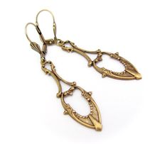 "Art Nouveau Earrings Antiqued golden brass Earrings. Fabulous long dangle Art Nouveau design earrings. Antiqued Brass, nickel free. Measure 2-1/4\" top to bottom. I am happy to switch to french ear wires or clip on if you prefer. Lever back design may vary. Dramatic Beauty...these can be worn every day to Wedding day! Sent to you with Aloha! More of my Artisan Jewelry: hawaiibeads.etsy.com" Victorian Gold Chandelier Earrings In Brass, Art Nouveau Gold Earrings For Wedding, Gold Art Nouveau Earrings For Weddings, Formal Brass Dangle Chandelier Earrings, Brass Plug Earrings For Wedding, Art Nouveau Gold Wedding Earrings, Bronze Drop Earrings For Wedding, Bronze Wedding Drop Earrings, Dangle Art