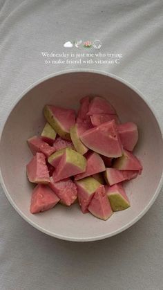 a white bowl filled with watermelon slices