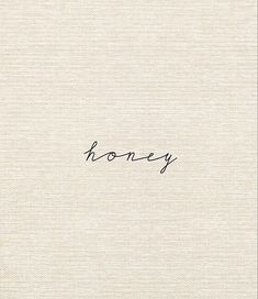 the word honey is written in cursive handwriting