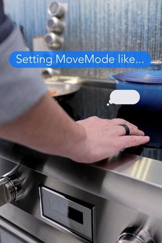 a person is touching the button on an appliance that says setting movemode like