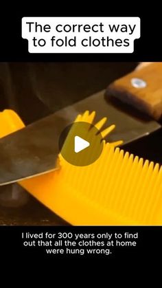 a yellow comb is being used to clean clothes