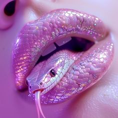 a purple snake with its tongue out and it's eyes open, on top of a pink surface