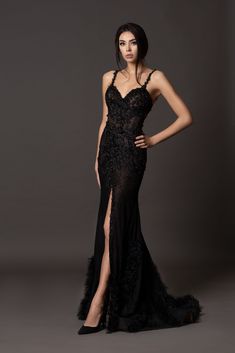 Craftes from black mesh and adorned with delicate lace, this elegant formal gown showcases a Sheath silhouette that reflects countless hours of meticulous handwork. Every intricate detail, from the lace to the pearls, is meticulously sewn by hand, creating a true work of art. The gown boasts a seductive open back, alluring straps, and a graceful train adorned with feather accents, ensuring a show-stopping and unforgettable presence. Formal Dress For Women, Nontraditional Bride, Black Formal Gown, Black Lace Gown, Black Formal Dress, Black Dress Formal, Floral Gown, Black Prom Dress, Black Formal