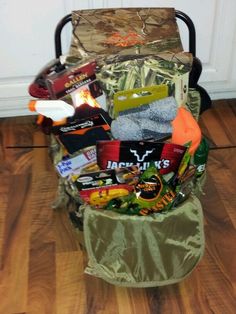 a chair filled with items sitting on top of a hard wood floor