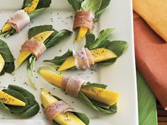 a white plate topped with green and yellow food