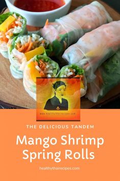 the delicious tandem mango shrimp spring rolls are made with fresh ingredients and ready to be eaten