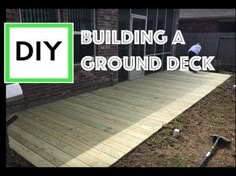 a wooden deck with the words building a ground deck