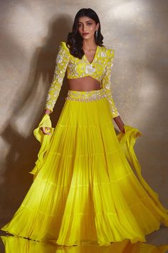 Yellow tiered lehenga with bead tasselled waistband. Comes with matching sequin bead embellished camellia patterned blouse and ruffle dupatta. - Aza Fashions Ruffle Gown Indian, Ruffle Dupatta, Haldi Dress, Camellia Flowers, Haldi Outfits, Haldi Outfit, Lehenga Saree Design, Simple Lehenga, Georgette Lehenga