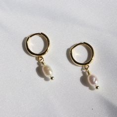 *PRODUCT DETAIL* EACH PEARL IS HANDPICKED AND UNIQUE. THIS DAINTY AND CASUAL EARRINGS WILL COMPLETE YOUR LOOK. BASE METAL IS STERLING SILVER (YAY FOR YOUR EAR LOBES!) ✧ Tiny oval pearl earrings. ✧ STERLING SILVER base metal ✧ Pearl size: 5-6mm width ✧ Pearl size and shape may vary ❤︎GIFT OPTION Select gift option and write a message to recipient at the check out. All jewelry will be packaged individually in its own box. Receipt will be sent via email to you. ✉︎ LET'S KEEP IN TOUCH https://www.in Dainty Pearl Earrings, Crescent Necklace, Casual Earrings, Freshwater Pearl Jewelry, Pearl Jewelry Wedding, Onyx Jewelry, Emerald Necklace, Earrings Pearl, Fresh Water Pearl