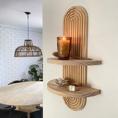 two wooden shelves with candles on them next to a dining room table and lamp hanging from the wall