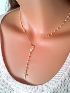 "This is a gorgeous rosary necklace with Genuine Peruvian Pink Opals on 14kt gold filled chain. A gold filled miraculous medallion sits at center of this lovely necklace. A simple and delicate 15mm gold filled cross hangs from the 2 1/2\" drop. Necklace may be ordered in a 16\", 18\", 20\" 22\" or 24\" length around the neck. (Priced accordingly, you choose size) Has spring closer clasp in back. Comes beautifully boxed, the perfect gift! All my jewelry is handmade and made to order. This necklac Gold Rosary As A Gift, Yellow Gold Rosary With Miraculous Medal As Gift, Handmade Gold Jewelry For First Communion, Gold Crucifix Necklace With Miraculous Medal, Gold Jewelry With Miraculous Medal For First Communion, Gold Miraculous Medal Jewelry For First Communion, 14kt Gold Jewelry, Jewelry Cleaning Solution, Rosary Necklace