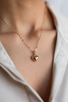 14k Gold  3D Heart Necklace,Mid Size Puffy Heart Pendant with Sequin Chain, Real Gold Jewellery, Gift for Her, Price Performance Gold NecklaceMaterial: Solid GoldKarat: 14 K (585)Approximate weight : 2,20 Gr (16.8 inch Chain İncluded)Available in different chain lengths.As with all of our products, this item is handmade and made to order.Want to Check Out More from Our SectionsFİEMMA http://www.etsy.me/3ukWhjeGold Rings http://www.etsy.me/39E9NGSGold Necklaces http://www.etsy.me/31NdjtOGold Brac Gold Heart Pendant Necklace, 14k Gold Heart Pendant Necklace With Adjustable Chain, 14k Gold Heart-shaped Jewelry With Adjustable Chain, 14k Gold Heart Jewelry With Adjustable Chain, Yellow Gold Heart Clavicle Chain Jewelry, 14k Gold Heart Pendant With Heart Beads Jewelry, Yellow Gold Heart Beaded Pendant Necklace, 14k Gold Heart Charm Necklaces With Adjustable Chain, 14k Gold Heart Charm Necklace With Adjustable Chain