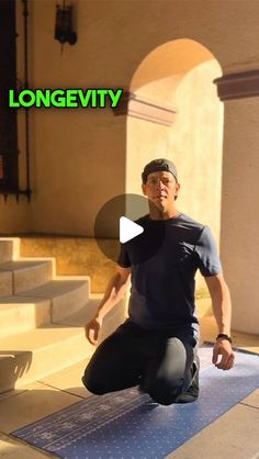 a man sitting on top of a blue yoga mat in front of stairs with the words longevity