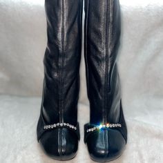 Questions? Leave A Comment Below! Please See All Pictures For Details As They Are Part Of The Description Of This Item. Please Contact Me If You Have Any Questions Or Concerns Before Purchase. Never Worn New Valentino Garavani Rhinestone Strap Heeled Leather Boots Size: Eur 37.5 Color: Black Condition: New Without Box Msrp: $1645 Description: A Glistening Rhinestone Strap Decorates The Round Toe Of A Leather Boot Balanced Upon A Slim Heel. 4" Heel Round Toe Side Zip Closure Cushioned Insole Leat Glamorous Leather Square Toe Heels, Elegant Embellished Ankle Boot Heels, Designer Evening Boots With Rhinestones, Designer Rhinestone Evening Boots, Embellished Closed Toe Boots For Formal Occasions, Formal Embellished Closed Toe Boots, Elegant Embellished Black Boots, Luxury Leather Heels With Rhinestones, Designer Leather Heels With Rhinestones