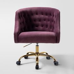 a purple office chair with gold wheels and casteors on an isolated white background,