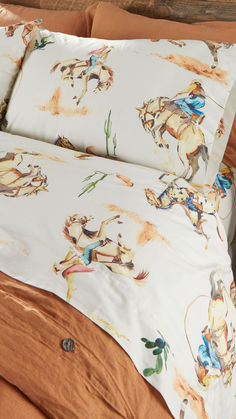 Wrap yourself in the rugged charm of the Old West with the Rod's Exclusive Cowboy Bronco Sheet Set. Inspired by the iconic bronco-riding cowboys of yesteryear, this sheet set features rustic hues, classic western motifs, and a timeless design that pays homage to the adventurous spirit of the frontier. Toddler Cowboy Hat, Western Motifs, Belt Buckle Jewelry, Girls Western Wear, Mens Western Wear, Felt Fashion, The Old West