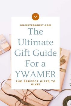 the ultimate gift guide for a yywamer is on top of some wrapping paper