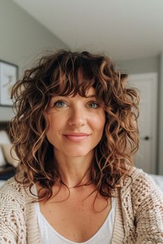 Curly hair with bangs is the dynamic duo your style's been craving. This perfect pairing adds instant drama, frames your face, and brings out your best features. From wispy side-swept fringes to bold, blunt cuts, Funny Curly Hair Pics, Wolf Bangs Curly Hair, Curly Hairstyles With Volume, 2025 Trendy Haircut, Short Curly Shag Haircut With Bangs, 2b Curly Hair Haircuts Shoulder Length, Curly Hairstyles For Thinning Hair, Haircuts Medium Curly Hair, Mid Length Hair Curly Styles