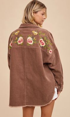 A oversized corduroy jacket with gorgeous floral embroidery on the back. Oversized Cotton Outerwear With Floral Print, Oversized Embroidered Cotton Outerwear, Spring Oversized Embroidered Outerwear, Oversized Embroidered Outerwear For Spring, Embroidered Relaxed Fit Outerwear For Fall, Oversized Long Sleeve Embroidered Outerwear, Spring Oversized Outerwear With Corduroy Collar, Oversized Spring Outerwear With Corduroy Collar, Oversized Corduroy Outerwear For Spring