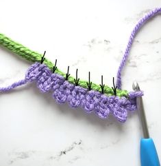 the crochet stitch is being worked on