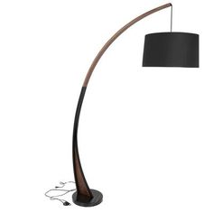 the floor lamp is made from wood and has a black shade on it's side