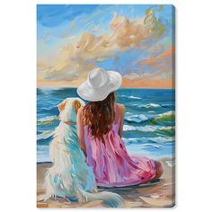 a painting of two women sitting on the beach with their dog looking out at the ocean