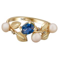 14 k solid gold ring with natural sapphire, diamonds and pearls. September birthstone ring. Gold leaves ring. 14k solid gold Weight: 2.5 g. Depends from size Central stone: Natural sapphire Weight: approx 0.80 ct, cut - oval Color: Blue (we have different shades of blue if you need something special let us know). Clarity: Transparent with inclusions (See in photo) Diamonds: weight - 0.06 ct (3 pieces x 0.02 ct), G/VS1, brilliant cut. Pearl: 3 pieces, freshwater, button shape, 3 mm each, white co September Birthstone Ring, Jewellery Pearl, Leaves Ring, Gold Leaf Rings, Diamonds And Pearls, September Birthstone Rings, Vintage Style Rings, Solid Gold Ring, Floral Ring