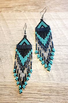 Authentic Choctaw Native American made earrings. Made with size 11 glass seed beads. Earring hooks are stainless-steel and hypoallergenic. Glass Seed Beads, Earring Hooks, How To Make Earrings, Turquoise Beads, American Made, Beaded Earrings, Seed Beads, Jewelry Earrings Dangle, Native American