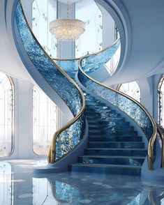 an artisticly designed staircase in the middle of a room with blue stairs and chandelier