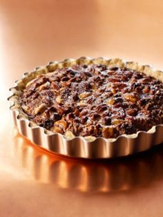 a pie sitting on top of a wooden table