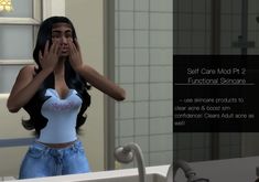 a woman standing in front of a bathroom sink holding her hands to her face and covering her eyes