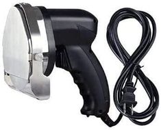 a black and silver blow dryer sitting on top of a white table next to a cord