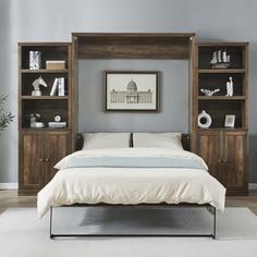 a bed sitting in a bedroom next to a book shelf