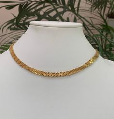 Stunning necklace signed by MONET. In shiny gold tone textured setting, with beautiful design! Very elegant, rare find, push in clasp! Marked Monet. 16 1/2 inches long from end to end! Excellent condition! It comes from a private collection!  PLEASE look at ALL pictures for measurements and condition as they are a very important part of the description, and what you will receive! Pictures are made with different light! Please note that this is sold "As Is", no returns please! The Link to my shop is: https://www.etsy.com/shop/MyWildWork Elegant Gold Herringbone Choker Necklace, Gold Herringbone Choker Necklace With Clavicle Chain, Gold Herringbone Choker Necklace, Formal Gold Plated Clavicle Chain Choker, Gold Metal Snake Chain Choker, Gold Snake Chain Choker With Adjustable Chain, Gold Herringbone Chain Choker, Gold Clavicle Snake Chain Choker, Gold Snake Chain Clavicle Choker