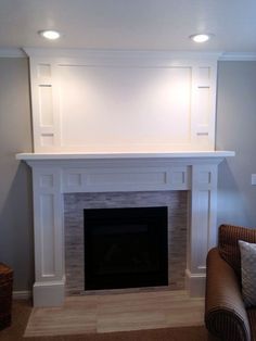 a living room with a fire place and couches