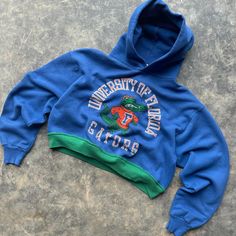 Vintage 90's Florida Gators University Custom Crop Russell Athletic Hoodie Crewneck  Size small/medium approx Measures approx 20" x 17" length  Crop style hoodie  Any questions just reach out Russell Athletic Hoodie, Ohio State Buckeyes Football, Florida Gator, Buckeyes Football, Athletic Hoodie, Crop Style, Crop Hoodie