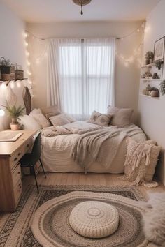 a bed room with a neatly made bed next to a window and a rug on the floor