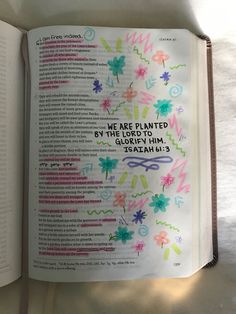 an open book with the words we are planted by the lord