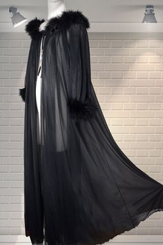 "Magnificent black double layered nylon full length dressing gown/robe by Jenelle of California. Long, sweeping gown, full floaty nylon, 3/4 sleeves, fluffy black marabou trim around the cuffs and collar - total Hollywood glamour. In good cared for condition. Size large on the label: Chest:  up to 48\" chest (does measure larger, but make allowance for movement - you don't have to be large to wear this by the way - it depends on the fit that you would like. Nape to hem:  54.5\" Please ask if you Black Long Sleeve Sleepwear For Evening, Sheer Fitted Party Robe, Black Long Sleeve Party Sleepwear, Black Long Party Robe, Long Black Evening Robe, Black Long Evening Robe, Fitted Black Party Robe, Stylish Gown, Black Ball Gown