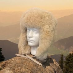 Experience ultimate luxury with our handmade Baby Alpaca Fur Trapper Hat. Crafted in the Andes region of Peru, this hat feels like a cozy cloud hugging your head. Perfect for outdoor activities like hiking, hunting, or living off-grid, it’s loved by hunters for its exceptional warmth—warmer than polar bear fur—while also regulating heat. Stay comfortable without overheating, as it adjusts to keep you warm when needed and cool when it’s not. The hypoallergenic baby alpaca fur on this Alpaca Fur T Trapper Hat Men, Polar Bear Fur, Fur Trapper, Fur Trapper Hat, Trapper Hat, Trapper Hats, Hat Handmade, Fur Hat, Off Grid Living