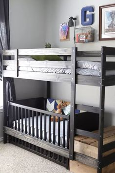 a bunk bed in a bedroom with two sets of drawers and one set of stairs