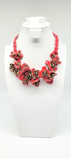 "Oscar de la Renta Necklace, Enamel Flower Necklace, Chunky Flower Necklace, Red Flower Necklace, Vintage Runway Necklace, Luxury Necklace Measurements: 18\" with a 3\" extender chain. Bib is 3\"L by 7\"W Metal: Gold Tone Findings: Lobster Claw Finish: Polished, Oxidized EXCELLENT CONDITION Talk about a flower statement necklace to put all other flower necklaces to shame! This MAGNIFICENT and HEAVY (344.5g vintage wonder was made by the one and only Oscar de la Renta and it is just breathtaking. The bib is SEVEN INCHES ACROSS and THREE INCHES HIGH and each petal has been THREE DIMENSIONALLY sculpted of polished and oxidized gold tone filled metal. The metal was than coated in high quality enamel in a bright pinkish red shade that is so feminine and so striking. In the middle of each bloom Elegant Red Jewelry With Flower Decoration, Red Elegant Flower Necklace, Red Flower Shaped Jewelry For Valentine's Day, Red Flower-shaped Jewelry For Valentine's Day, Valentine's Day Red Flower Shaped Jewelry, Red Flower Charm Jewelry For Valentine's Day, Elegant Red Flower Charm Necklace, Red Necklace With Flower Charm Pendant, Red Flower Pendant Jewelry With Charm